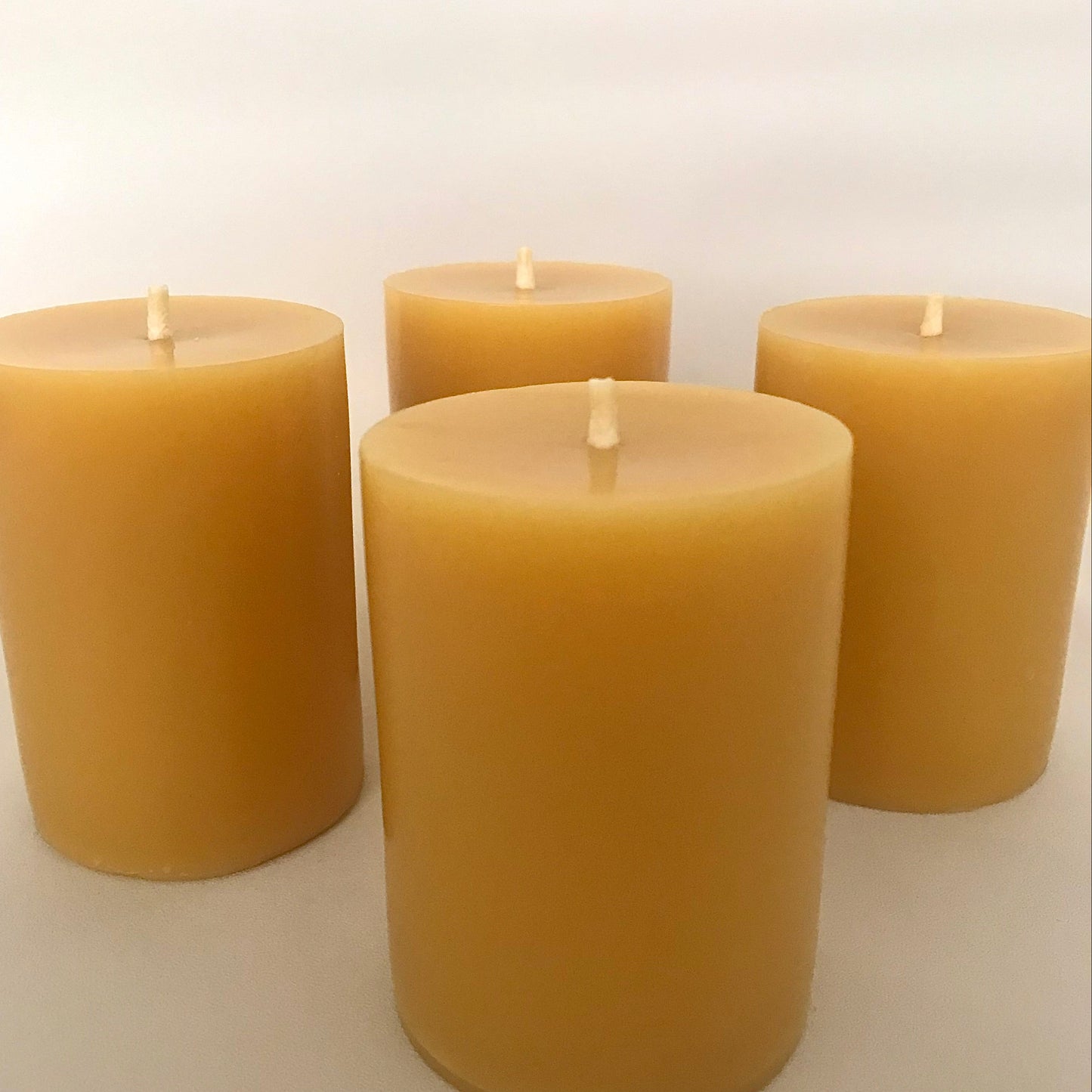 Set of Four — Small Classic Round Beeswax Pillar Candles